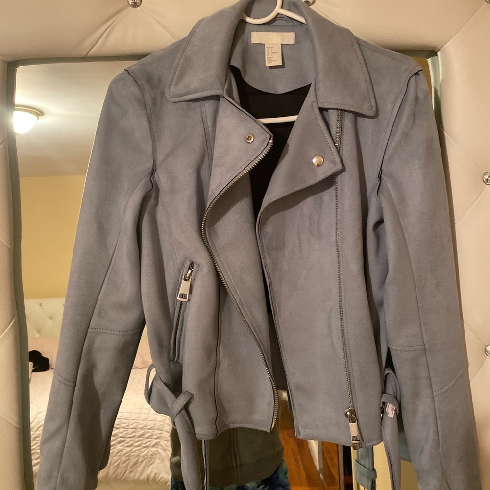 Suede light blue jacket.